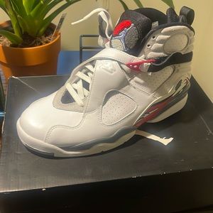 This is a Air Jordan 8 white with red and black trimming size 10 D with